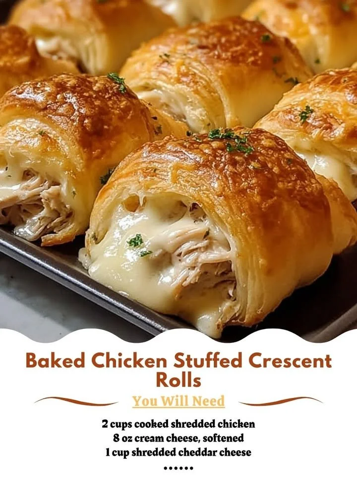 Delicious baked chicken stuffed in crescent rolls served on a plate
