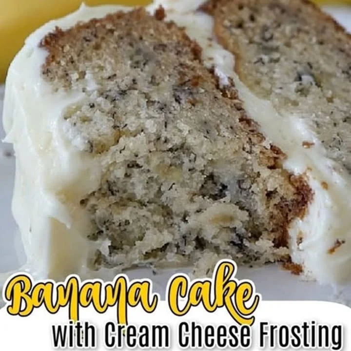 Delicious banana cake with cream cheese frosting on a white plate