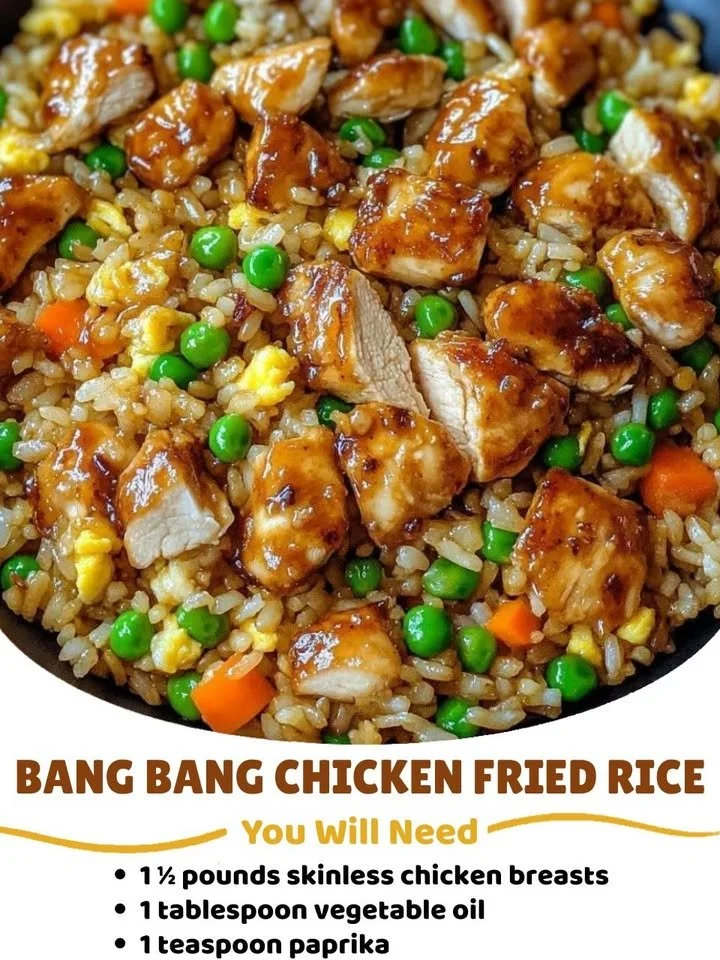 Plate of Bang Bang Chicken Fried Rice garnished with green onions.