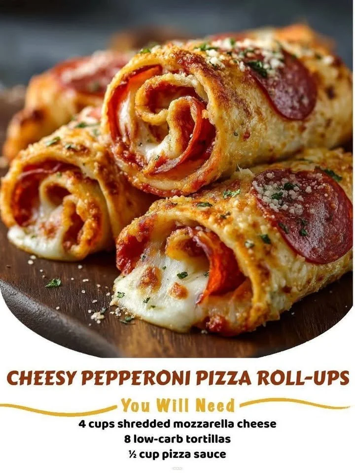 Cheesy pepperoni pizza roll-ups served on a plate.