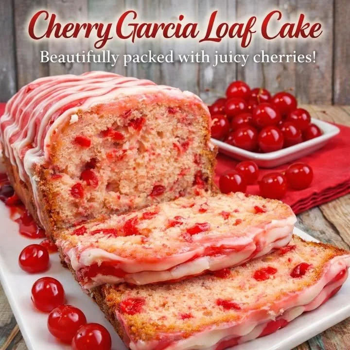 Slice of Cherry Garcia Loaf Cake with cherries and chocolate chunks