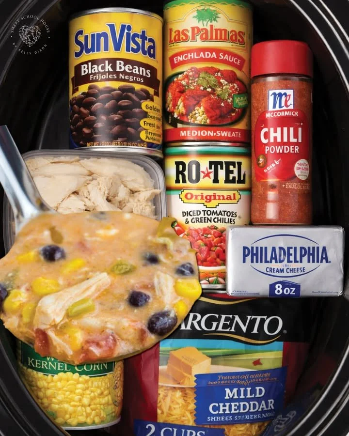 Bowl of homemade Chicken Enchilada Soup garnished with cilantro and lime