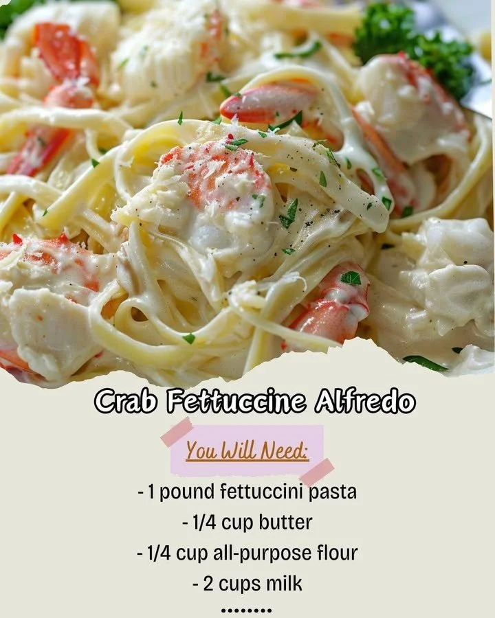 Delicious Crab Fettuccine Alfredo garnished with parsley and served in a bowl.
