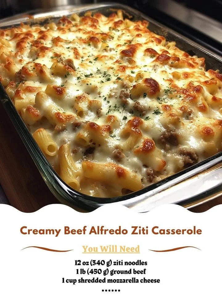 Creamy Beef Alfredo Ziti casserole topped with cheese and herbs in a baking dish