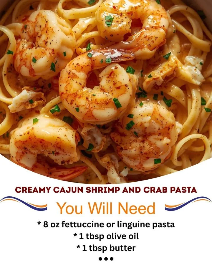 Creamy Cajun shrimp and crab pasta dish with parsley garnish