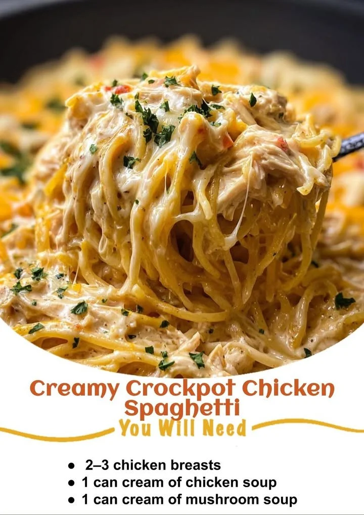 Creamy crockpot chicken spaghetti served in a bowl with herbs on top.