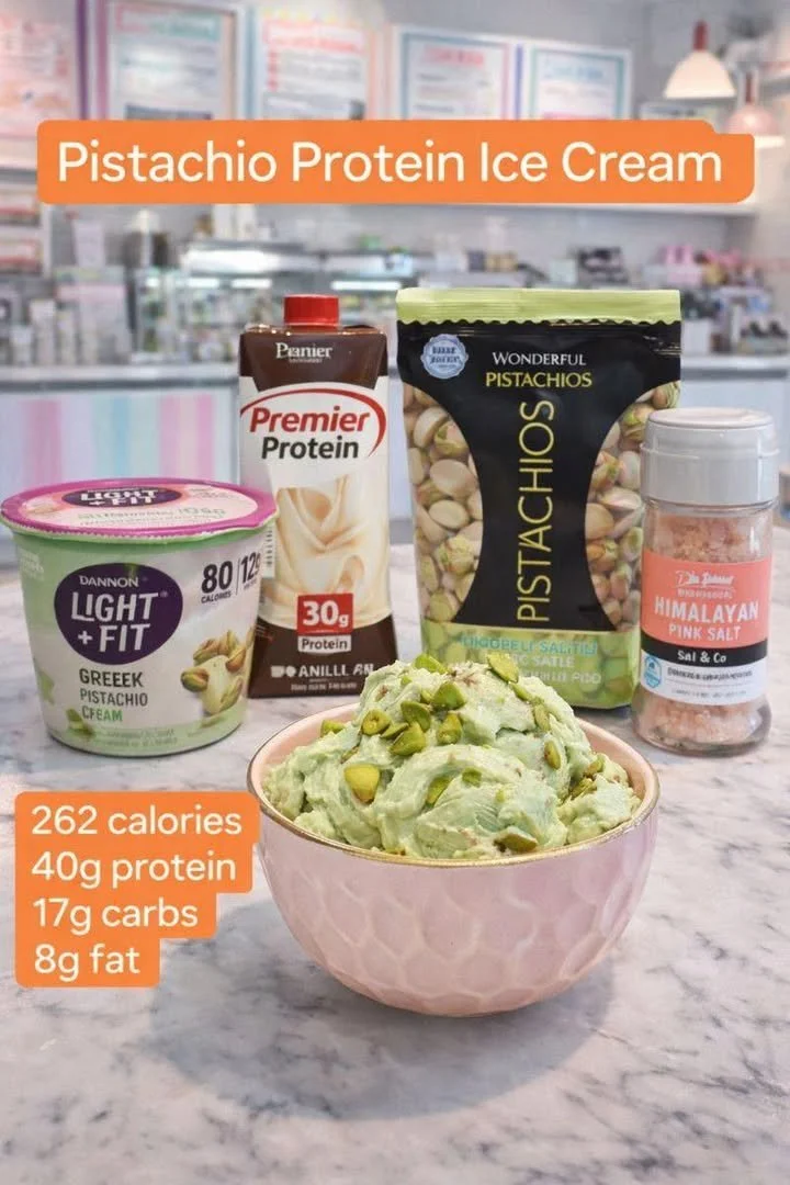 Creamy pistachio protein ice cream in a bowl with chopped nuts on top