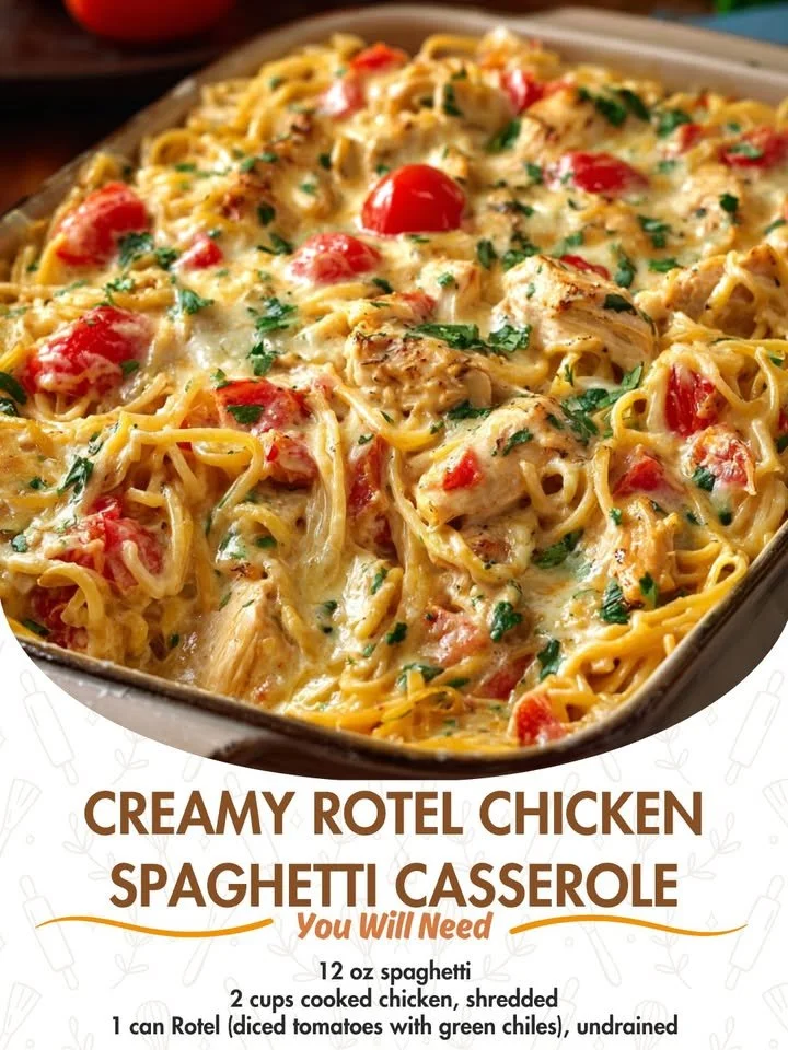 Creamy Rotel chicken spaghetti casserole ready to serve, topped with cheese.