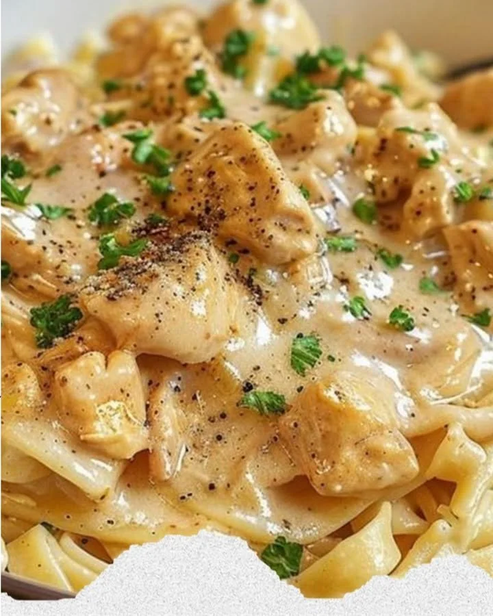 Crockpot Angel Chicken served with creamy sauce and herbs