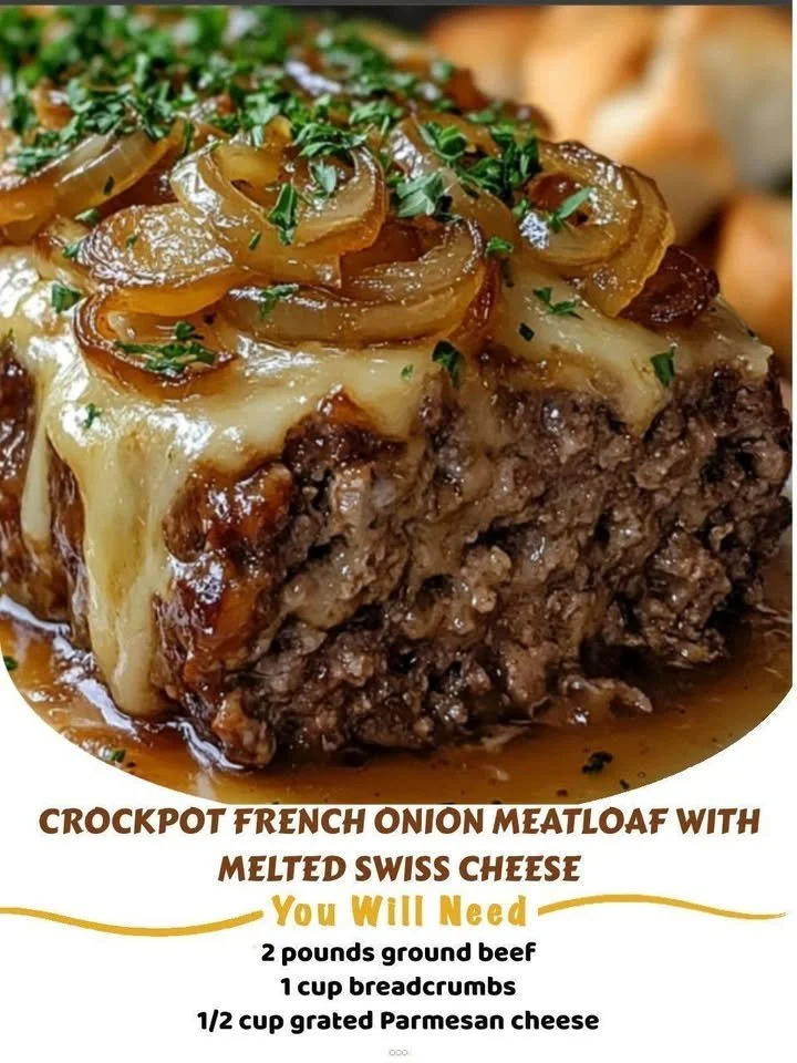 Delicious Crockpot French Onion Meatloaf topped with melted Swiss cheese
