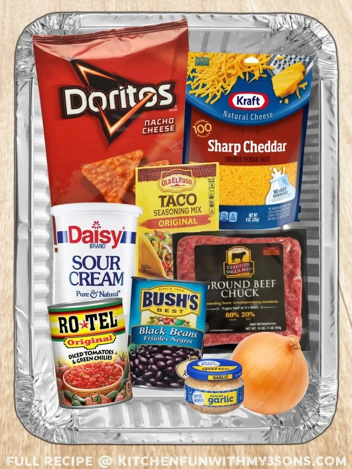 Delicious homemade Dorito Casserole topped with cheese and crunchy chips