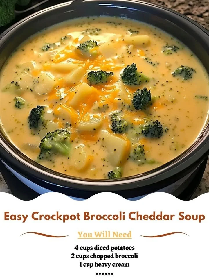 Bowl of easy crockpot broccoli cheddar soup garnished with fresh herbs
