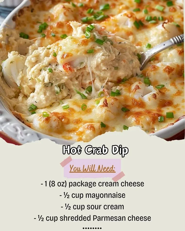 Delicious hot crab dip served in a bowl with garnish, ideal for appetizers and parties.