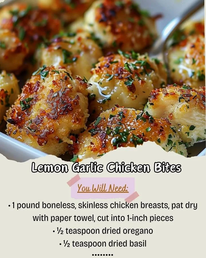 Lemon Garlic Chicken Bites served with fresh herbs on a white plate