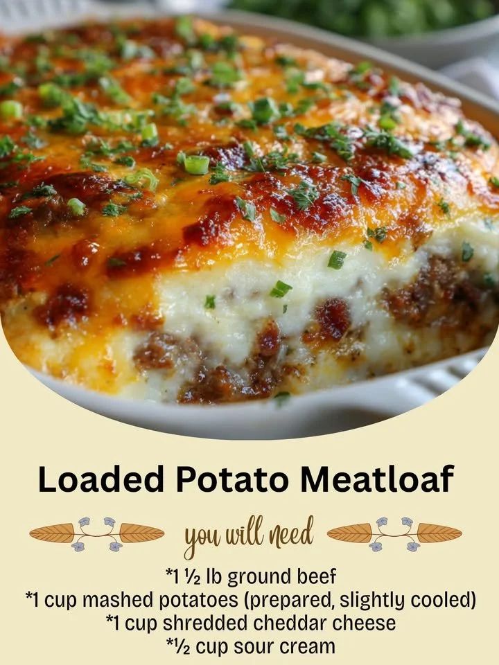Loaded Potato Meatloaf with cheese and herbs on a cutting board