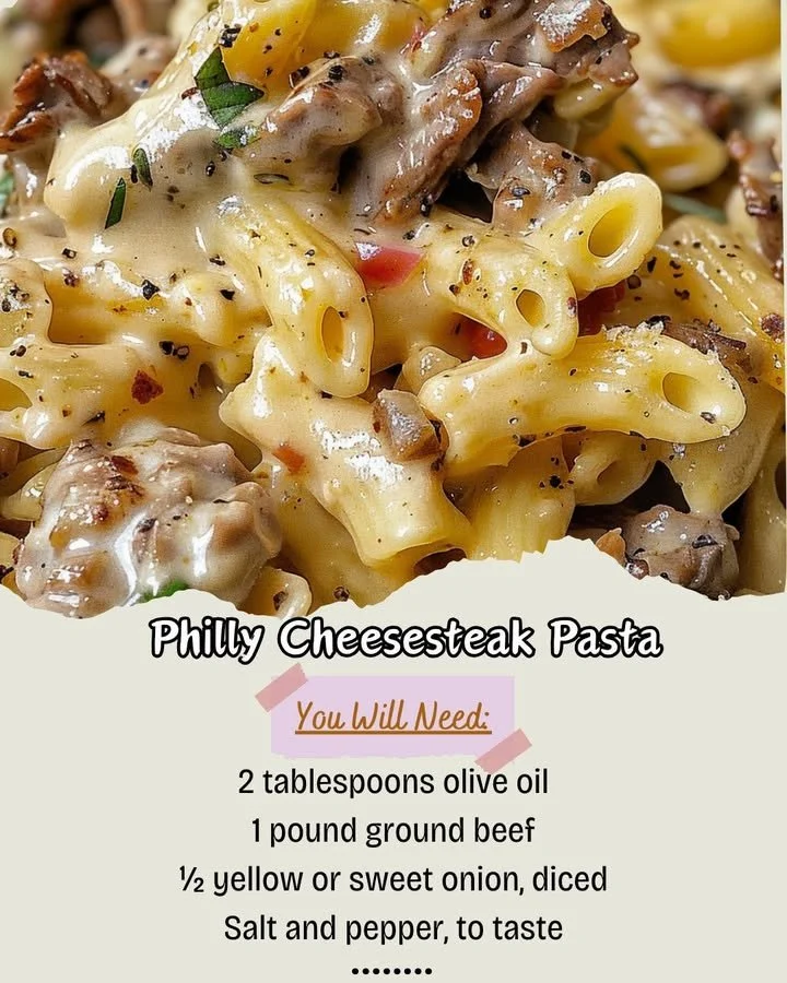 Delicious Philly Cheesesteak Pasta dish garnished with peppers and cheese.
