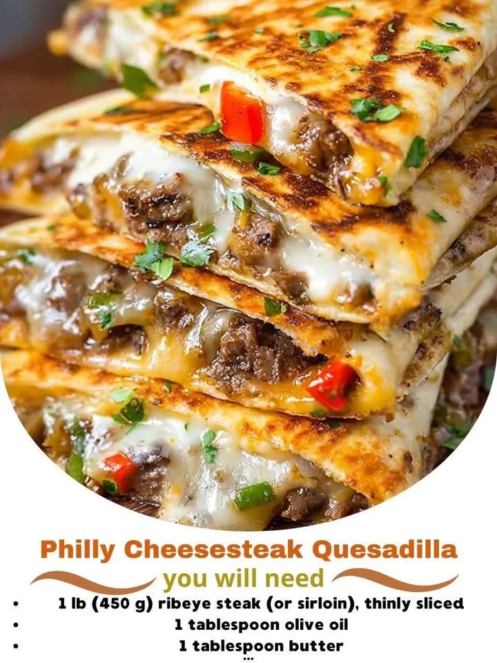 Delicious Philly Cheesesteak Quesadilla served on a plate with toppings.