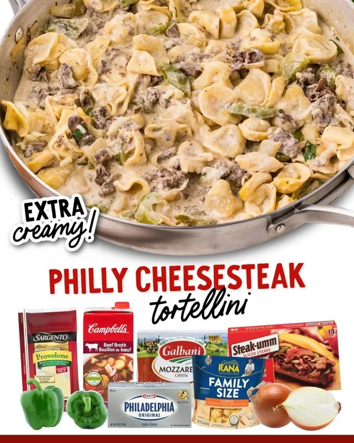 Philly Cheesesteak Tortellini served in a bowl with cheese and herbs