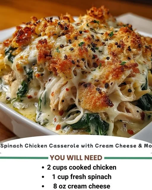 Spinach Chicken Casserole topped with cream cheese and mozzarella cheese.