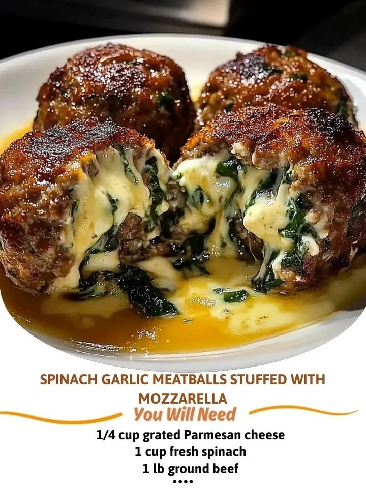 Spinach garlic meatballs stuffed with mozzarella cheese on a plate