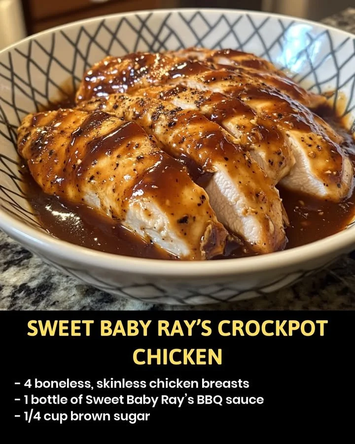 Sweet Baby Ray's Crockpot Chicken served in a bowl with herbs and spices