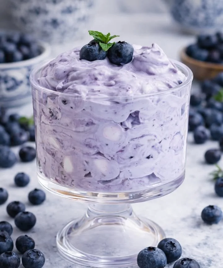 Delicious Blueberry Fluff Salad served in a bowl with fresh blueberries