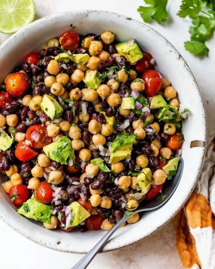 Colorful Fiesta Bean Salad with beans, veggies, and dressing