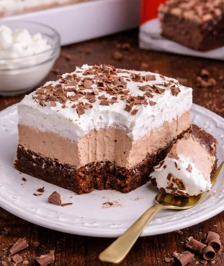 Delicious and creamy French Silk Brownies topped with chocolate