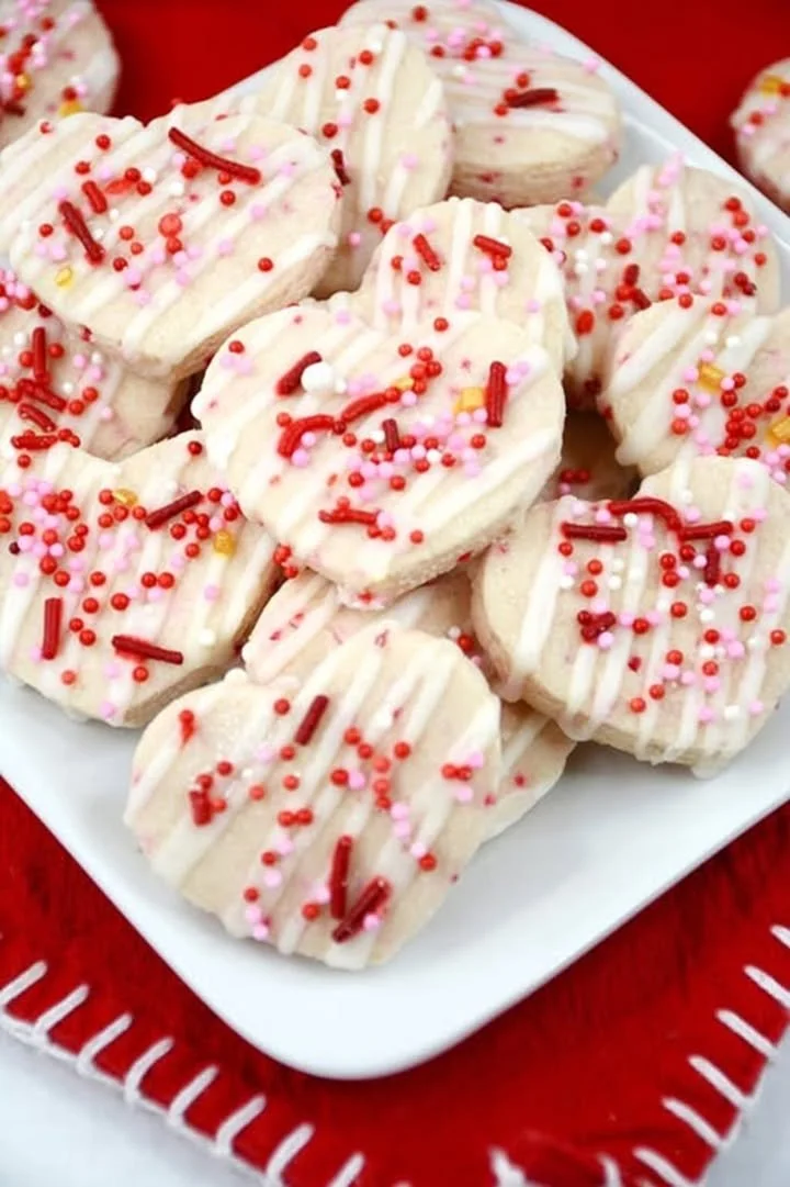 Valentine's Day themed shortbread cookie bites decorated with hearts